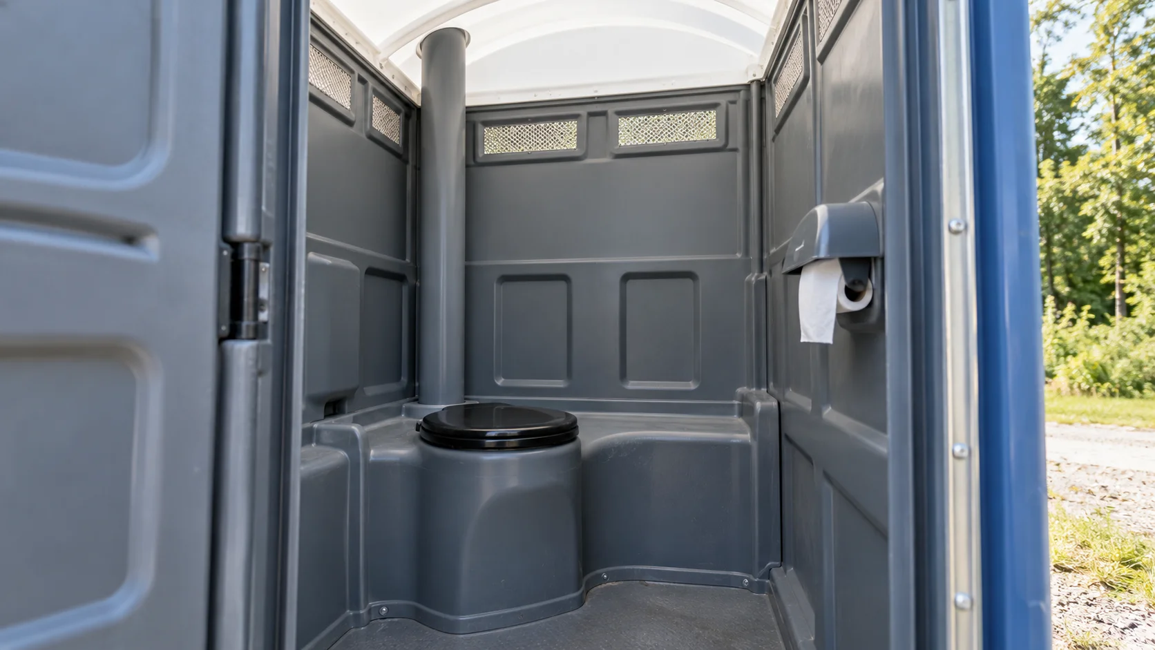 Clean interior of a standard portable restroom