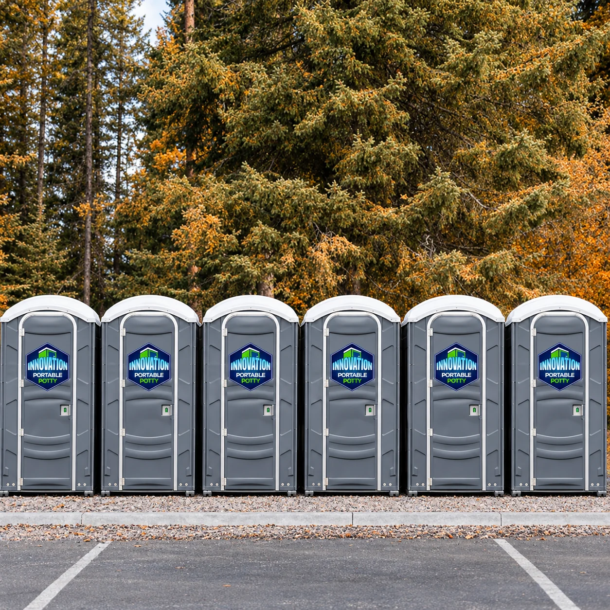 A lineup of Innovation Portable Potty restroom units ready for rental